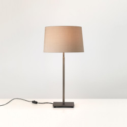 Astro Azumi Table is a series of elegant table lamps, bronze