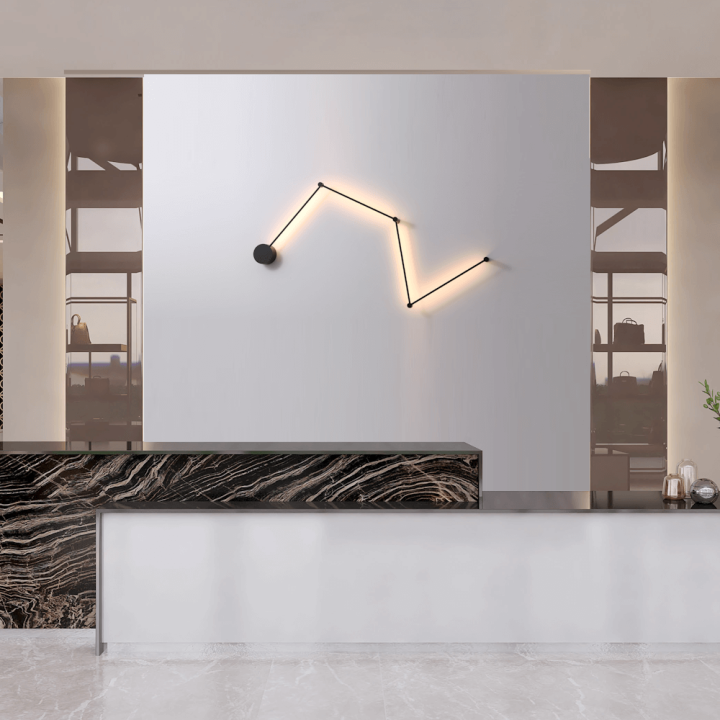 ELKIM STIKI 4 adjustable LED wall lamp 3000K with a geometric shape