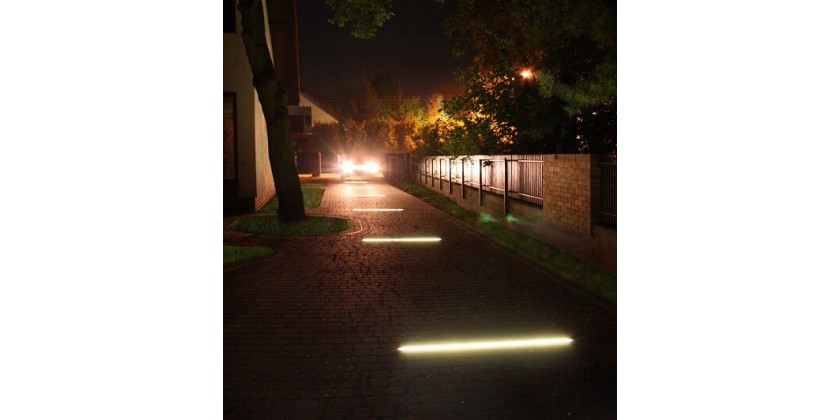 Linear backlight for entry from paving stones